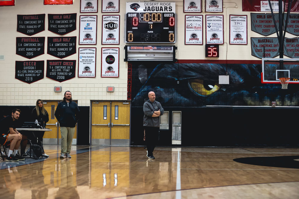 Coach keeping an eye on practice